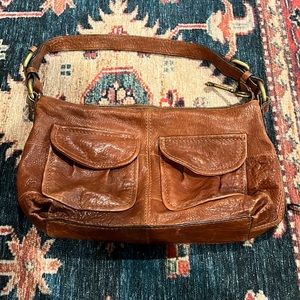 Fossil purse.  Has additional longer strap that is removable